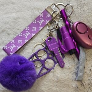 Purple Monogram Wristlet Keychain with Pom Pom and Accessories